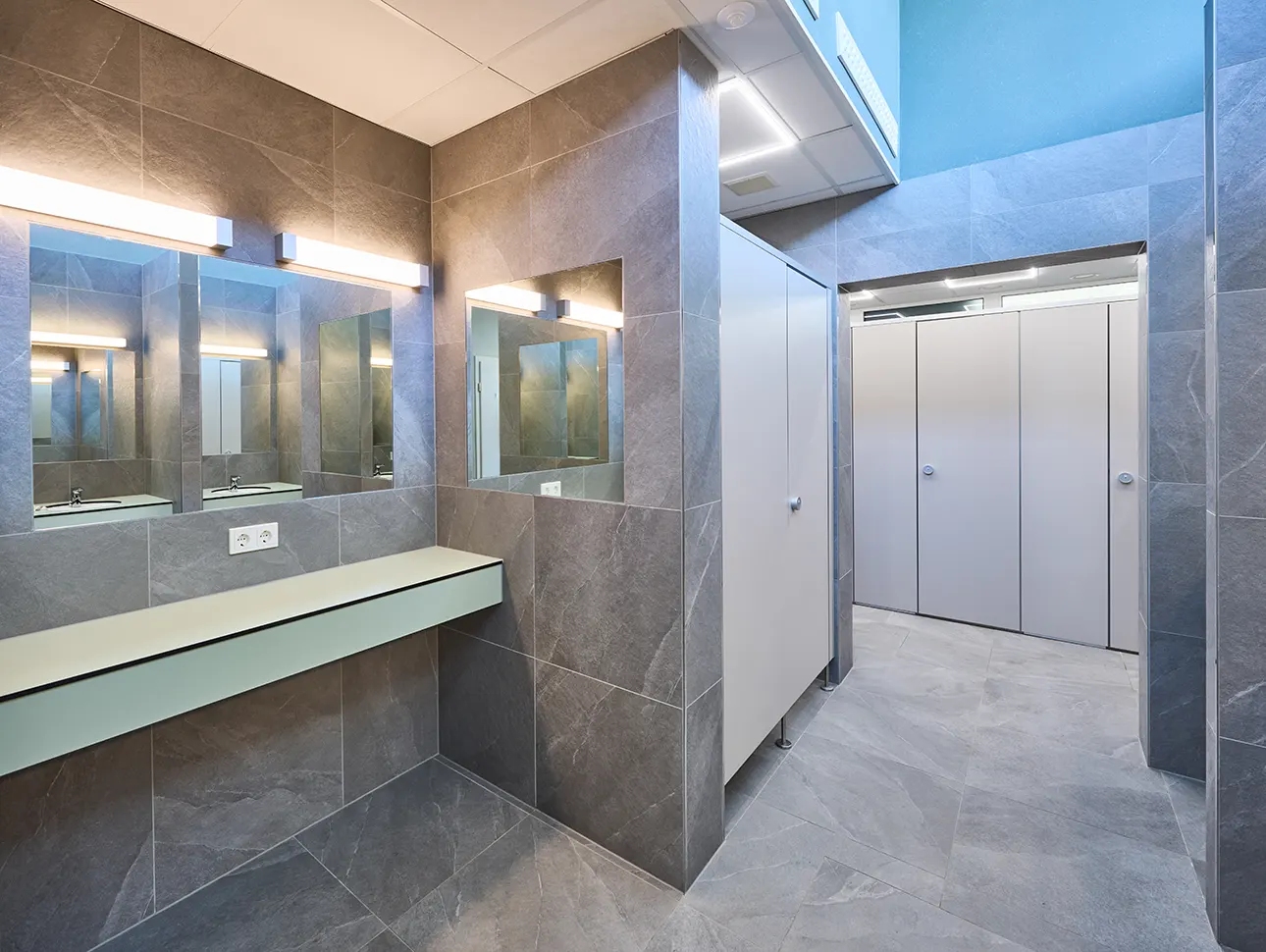 Shower dividing walls and shower cubicles