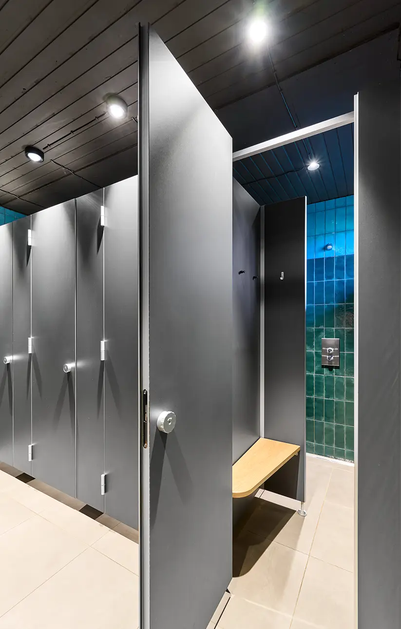Shower dividing walls and shower cubicles
